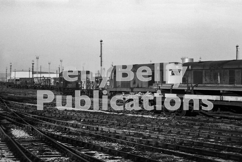 LPPC DSL BW 0822 
 An old-school British Railways freight yard still in full use in the early 1970s as a visit to Toton between Christmas and New Year in the early 1970s revealed. Just imagine that to reach the Traction Maintenance Depot we had to cross this yard first. Authorities would have a fit nowadays and thats supposing you could gain initial access anyway! Meanwhile on this day the common combination of multiple Class 20s tick over waiting for their next colliery or steel works trip working and, no doubt, providing warmth and protection from the bitter cold for their crew. At this time no less than 109 of these locos were allocated to the East Midlands depot. 
 Keywords: Digital, Rights Managed, Stock