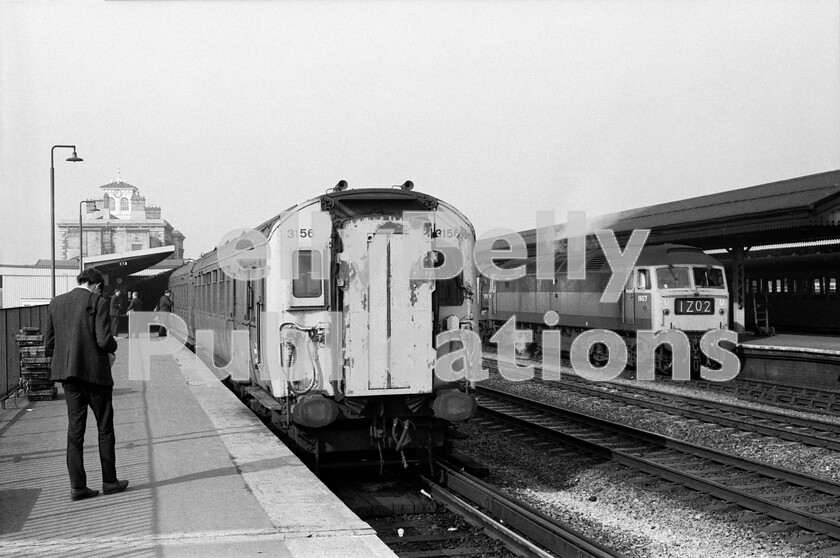 LPPC DSL BW 0286 
 Rationalisation and the end of steam spelt closure for Reading Southern station and motive power depot by the early 1970s. They were replaced with a soulless prefabricated waiting room and a new platform attached to Reading General Station which was accessed from the Southern line by a short rising spur. It is perhaps ironic that the London Waterloo services at the time were being maintained by cascaded 4-COR EMUs that dated back to the 1930s themselves. Here 3156, itself assembled post war to replace a 4 BUF destroyed in the conflict, waits to leave for the capital looking the worse for wear in its final years of use, as well as being older than some of the steam locos that had been replaced. Behind, pausing at the Western Region station is Class 47 Brush Type 4 number 1907 (later 47231, then 57010 Freightliner Crusader), a regular on the route, with 1Z02, a special, possibly from the Bristol area and possibly heading down the linking spur to the Southern itself! 
 Keywords: BR, Reading, 4COR, 3156, Class 47, 1907, 47231, 57010, 'Freightliner Crusader', 1Z02