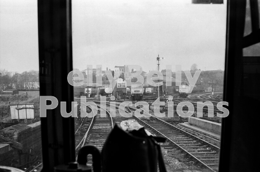 LPPC DSL BW 0631 
 From the drivers seat of a WR Cross Country Class 119 DMU in the down Hereford bay at Worcester Shrub Hill, we see a Hymek Type 3 Class 35 going on shed after working in on an express from London. 85A is, typically, bustling with movements and stabled locos, with Classes 45 and 47 visible in addition to the Hymeks and a DMU, whilst a light Sulzer Type 2 Class 25 is creeping round the goods line on the right. 
 Keywords: BR, Western, Worcester Shrub Hill, Class 25, Class 35, Hymek, Class 47, Class 45, Class 101, DMU, Shed, Depot, 85A