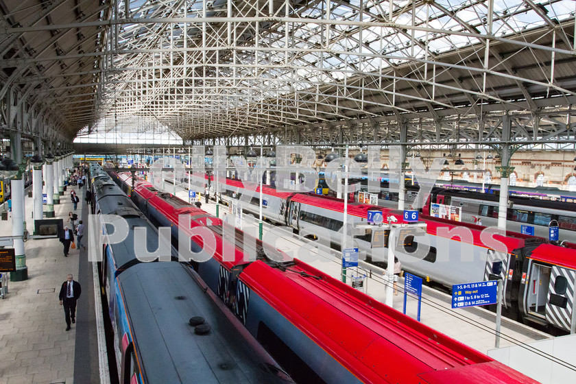 LPIS-D-DSL-CO-0033 
 A view of Manchester Piccadily station and its magnificent roof on 12th June 2014. 
 Keywords: Colour, Digital, Greater Manchester, Manchester Piccadily, Midland, Northern, Passenger, Pendolino, Rights Managed, Station, Stock, Virgin Trains