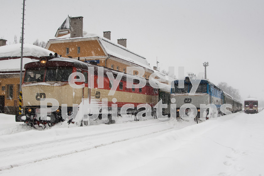 LPAP-EUR-CO-0003 
 Extreme snow (even by Czech standards), in February 2006, saw some services struggling, although they still carried on! Here at Jesenik on the 12th day of that month, silenced 749248 has arrived on the first service from Brno, whilst on the right 749259 has arrived on the second train from Brno. 
 Keywords: Czech, Czechoslovakia, Passenger, Colour, 2006