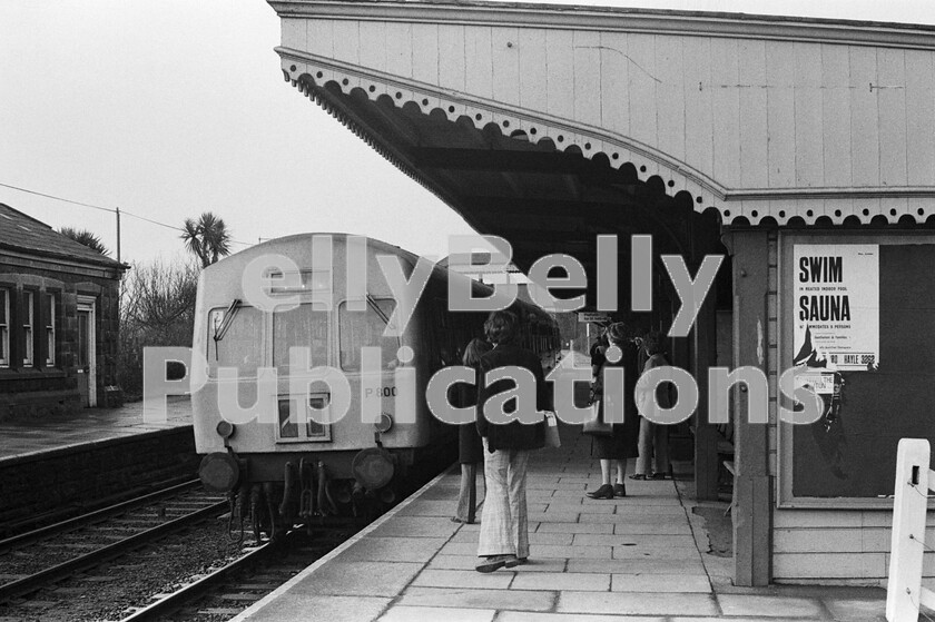 LPPC DSL BW 0903 
 Next stop Hayle. The morning stopper from Penzance to Plymouth draws to a halt and picks up custom at St Erth. In a world of Gloucester and Swindon-built rolling stock, unusually it is formed of a Metropolitan Cammell three car DMU instead of the usual Cross Country set. The Class 101 DMU (Set P800 - 51445, 59549, 51515) was transferred from Hamilton (Scotland) to Laira on 25th May 1974, and the set is seen here some time in the Autumn/Spring of 1974/5. 
 Keywords: BR, Western, Class 101, P800, 1974, St Erth, Passenger, DMU